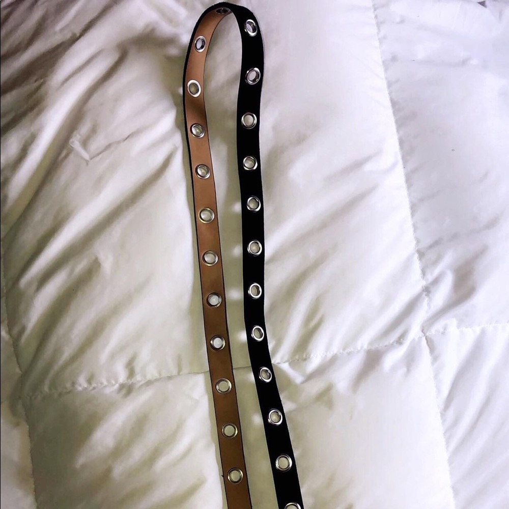 Black belt with silver holes